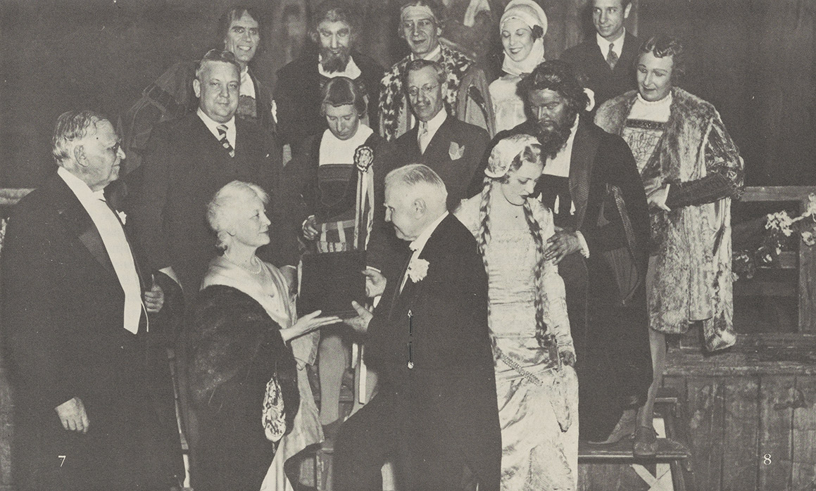 Mrs. Belmont honors Walter Damrosch at the his debut with the Metropolitan Opera. Behind her are Jubilee Celebration.