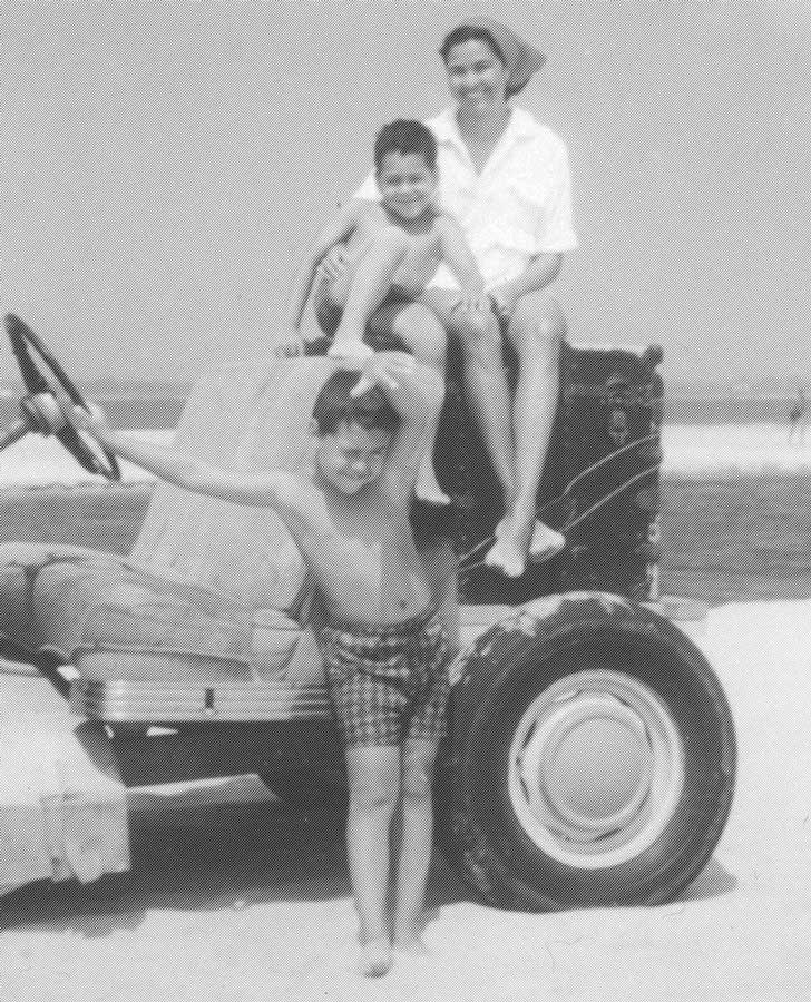 Barbara with her sons at the beach
