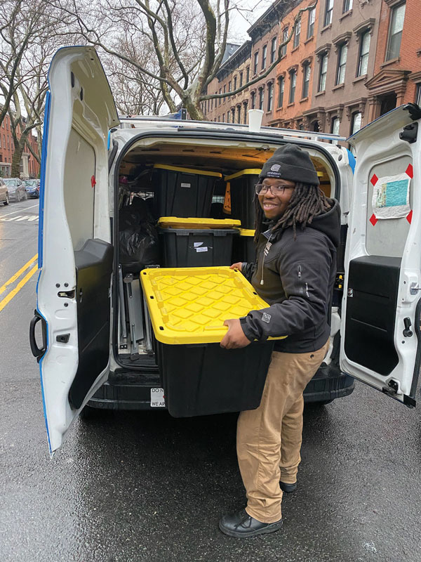 Roger Nunez unloading a van