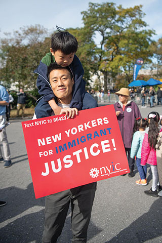 Father and son at NYIC event