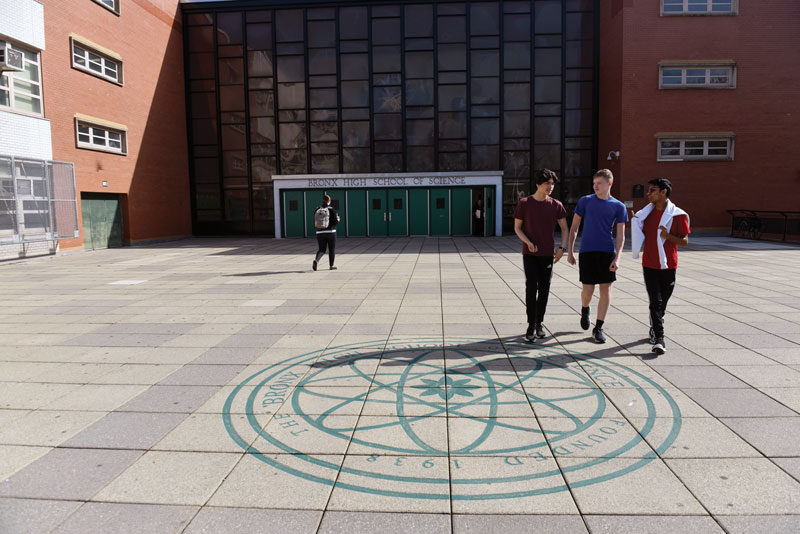 Teen boys in front of Bronx High School of Science