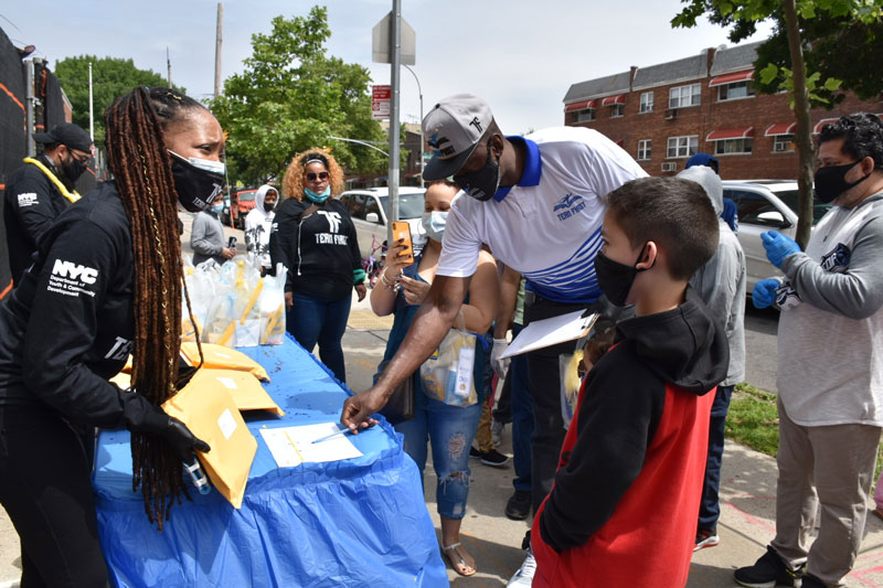 Team First provides laptops to NYC families in the early days of the COVID-19 pandemic.