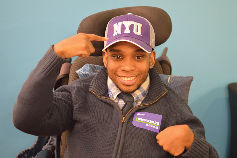 Tyrese wearing an NYU hat