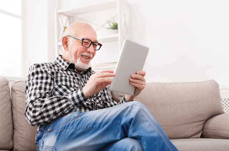Older man on tablet