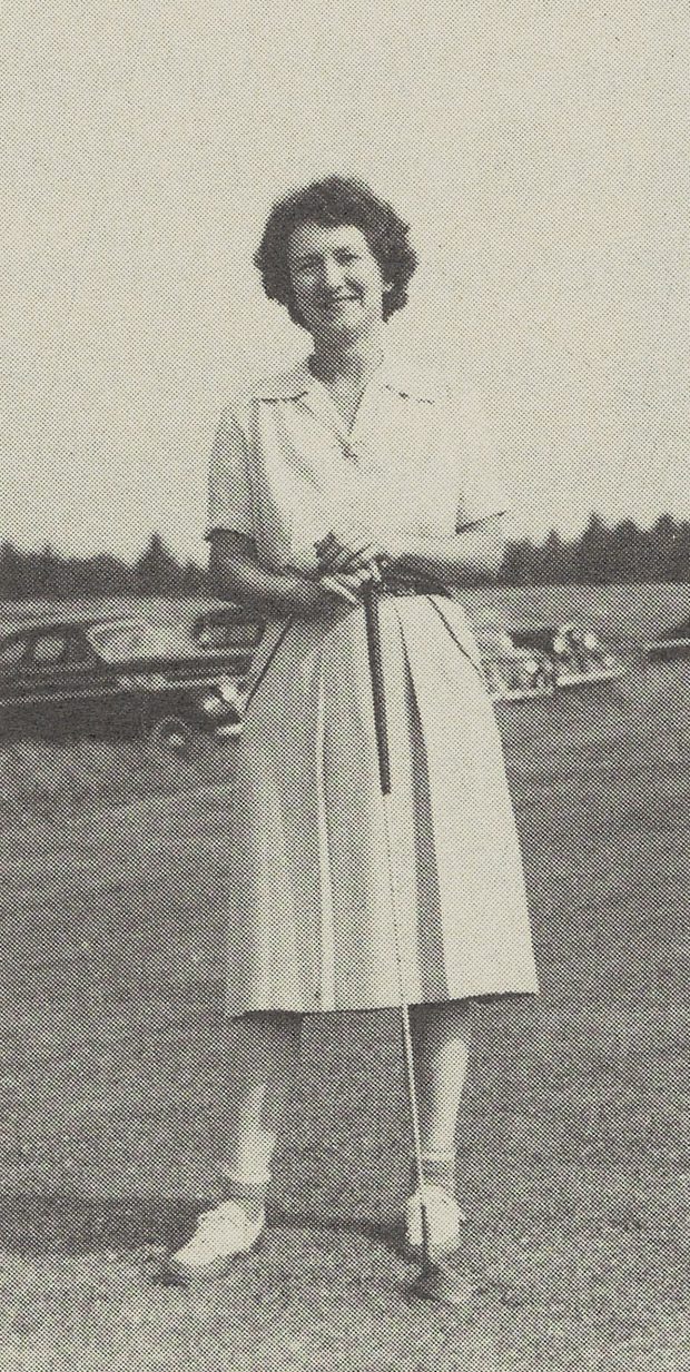Ruth with a golf club.