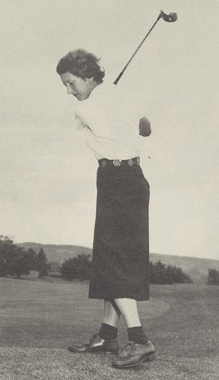 Practicing her top swing.