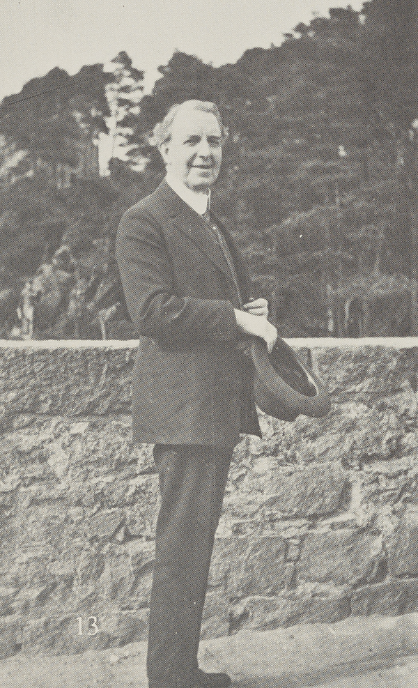 John Robert Gregg standing with his hat in his hands in Abderdeenshire, Scotland in 1927.