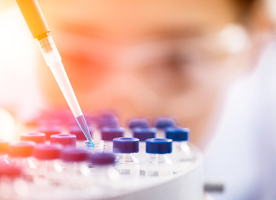 Female researcher at work in a medical lab.