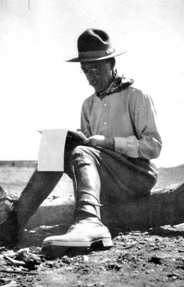 Charles Bernheimer in the field with his journal. Photo Credit: Canyon County Zephyr