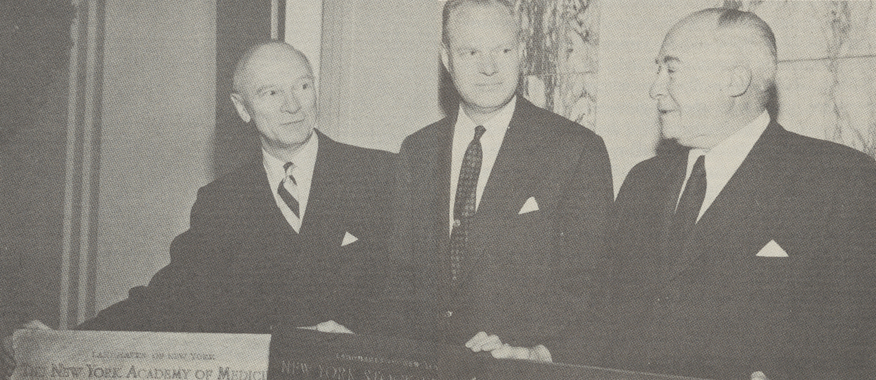 In this photograph, taken on Nov. 21, 1957, Ralph Hayes, Ruddick C. Lawrence and Bernard Gimbel are shown with markers for the New York Academy of Medicine, the New York Stock Exchange, and Grand Central Terminal.