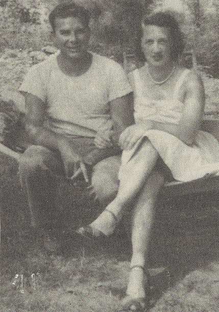 Lloyd (left) and Margaret MacMahon (right) sitting side by side in 1953.