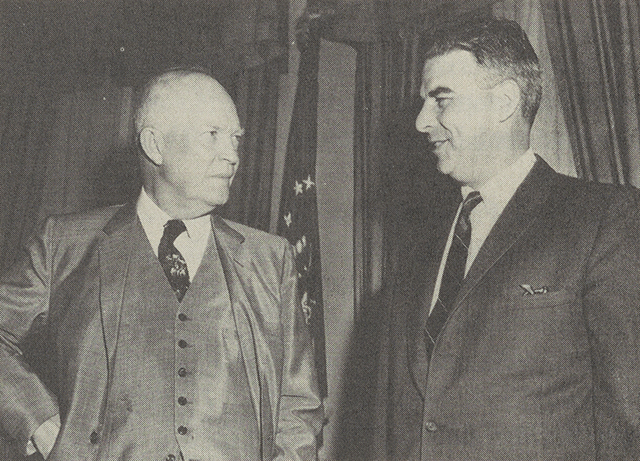 President Eisenhower (left) with Lloyd MacMahon (right) in 1958.