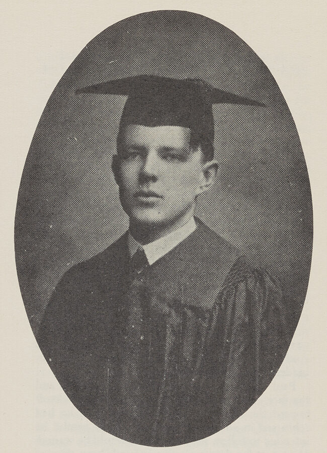 Paul C. Whipp headshot in his cap and gown.