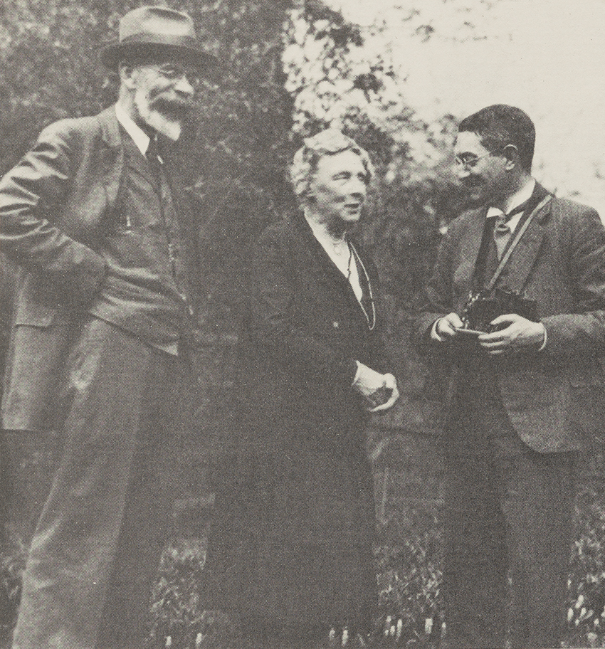 From left to right: Yalden; AnnieJump Cannon, an astronomer with the Harvard College Observatory; and William T. Olcott, one of the founders of The American Association of Variable Star Observers. They are standing outside in a field with trees behind them. The year was 1929.