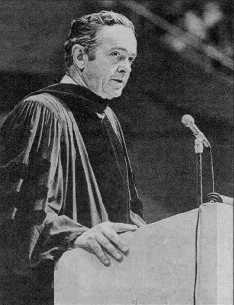 Randall McIntyre standing at the podium.