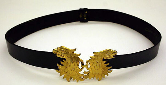 A Calderon black belt with birds in gold from 1986-1970.