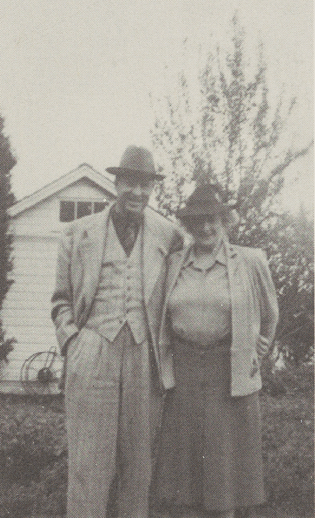 Enders (left) and Polly (right) Voorhees standing in a yard at their Long Island home in 1937.