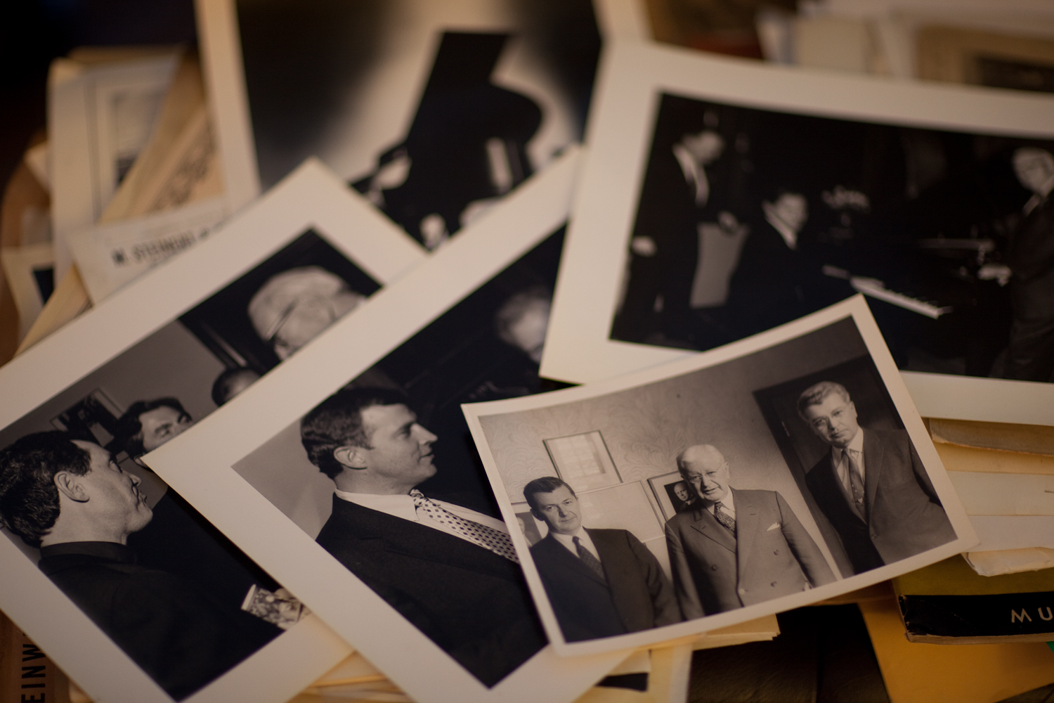 A stack of black and white photographs. Photo source: msteinert.com.