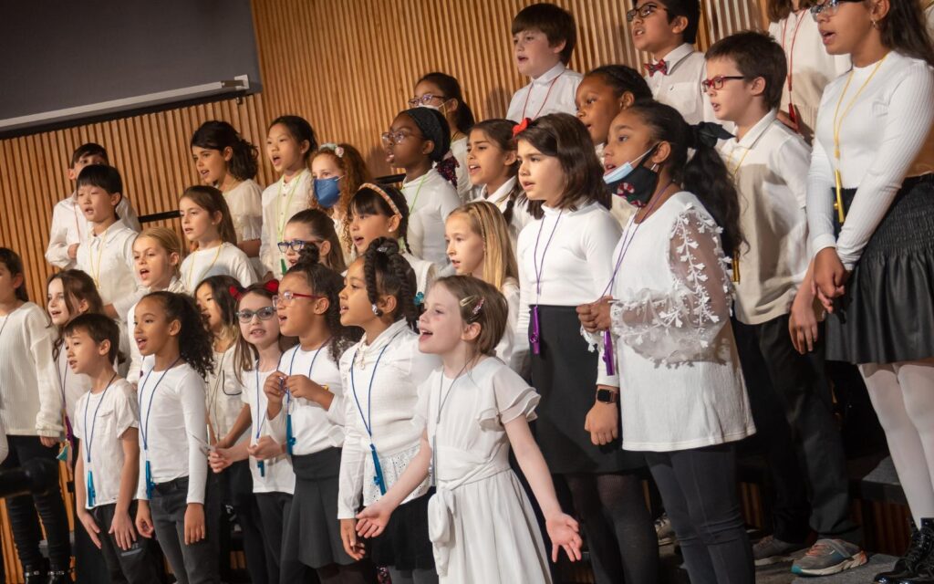 A choir of children singing.