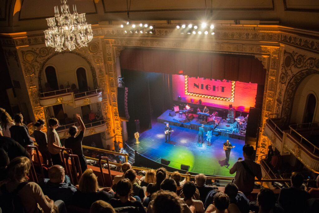 Guitarists perform on the Apollo Theater stage on Amateur Night.