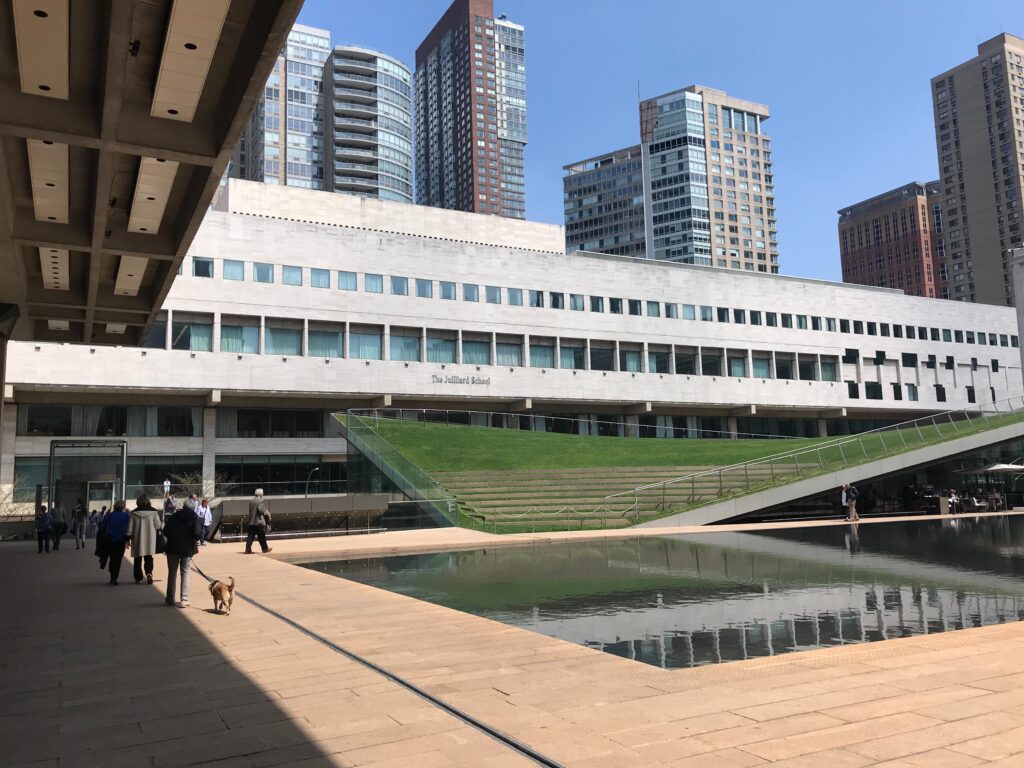 A wide-view of the Julliard School building.
