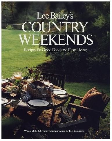An outdoor table set on the cover of Lee Bailey’s Country Weekends book.