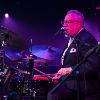 Boby Sanabria playing the drums at our Bronx centennial event